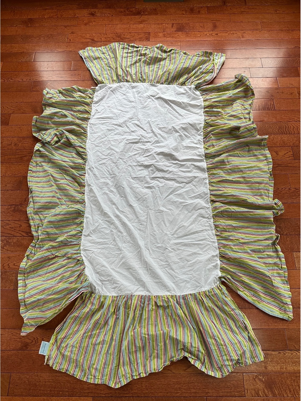 Updated description The Land of Nod Princess & The Pea Crib Bed Skirt